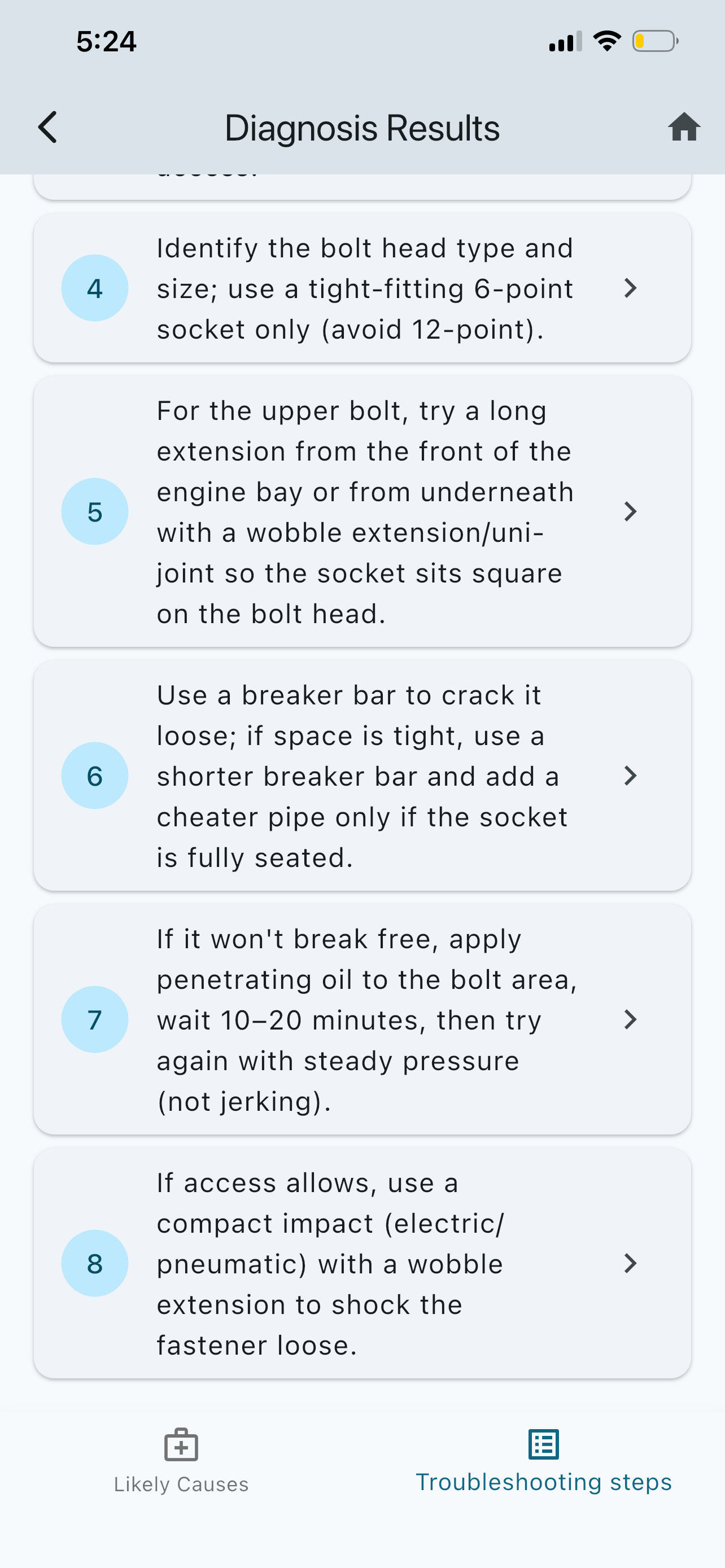 Pocket AI Mechanic troubleshooting steps list for removing a stuck starter motor bolt